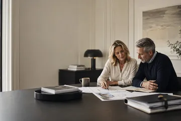 Couple reviewing an estate plan representing Alaska spousal trust planning