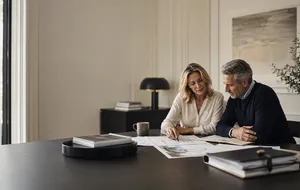 Couple reviewing an estate plan representing Alaska spousal trust planning